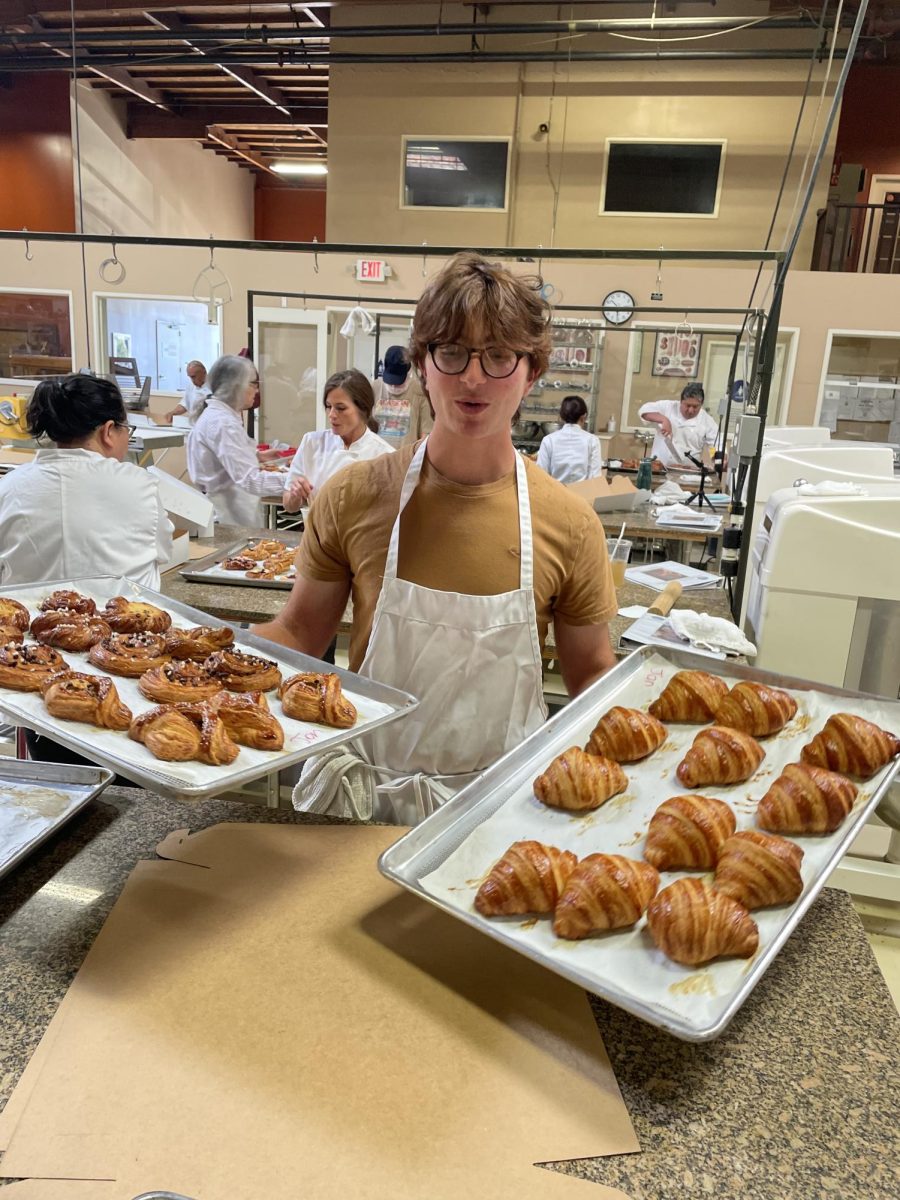 In the Lab - Bakhash works hard in the kitchen, carrying hot trays of freshly baked croissants and other pastries. these pastries often took a two-to-three day process, but the final product was always worth it.