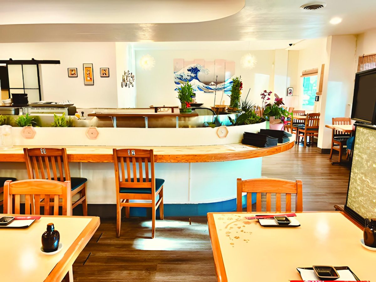 Sushi Bar - A mostly empty restaurant before lunch hours. Kanji Sushi and ramen is located at 4131 El Camino Way Orders can be placed a (650) 485-2996 or https://ww.kanjisushiramencon/